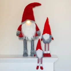 Weihnachtsgnom Mit Baumelnden Beinen